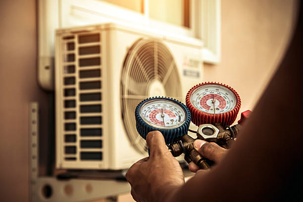 Professional Heat Pump Repair technician working in Lanesville, IN
